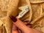 Sheer Y2K Dior logo bodysuit style product detail close up tag photo